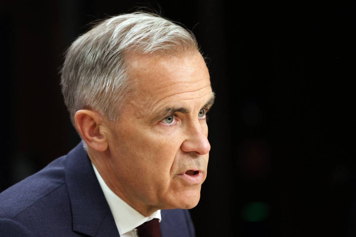 Canadian Prime Minister Mark Carney. (Photo by Dave Chan / AFP)