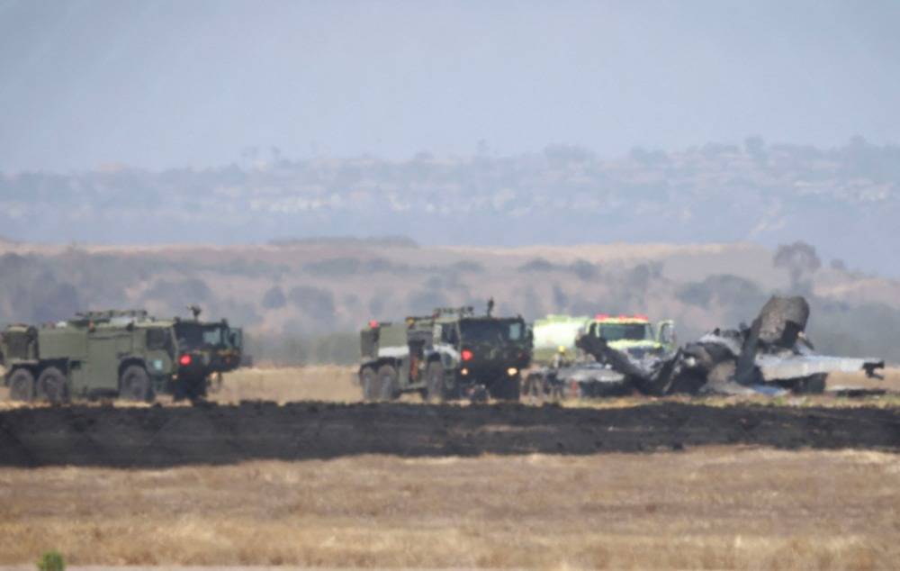 Fire crews work around the wreckage of a US Marines’ F-35B fighter jet after it crashed into a field near Miramar Air Base in San Diego. Photo by AFP