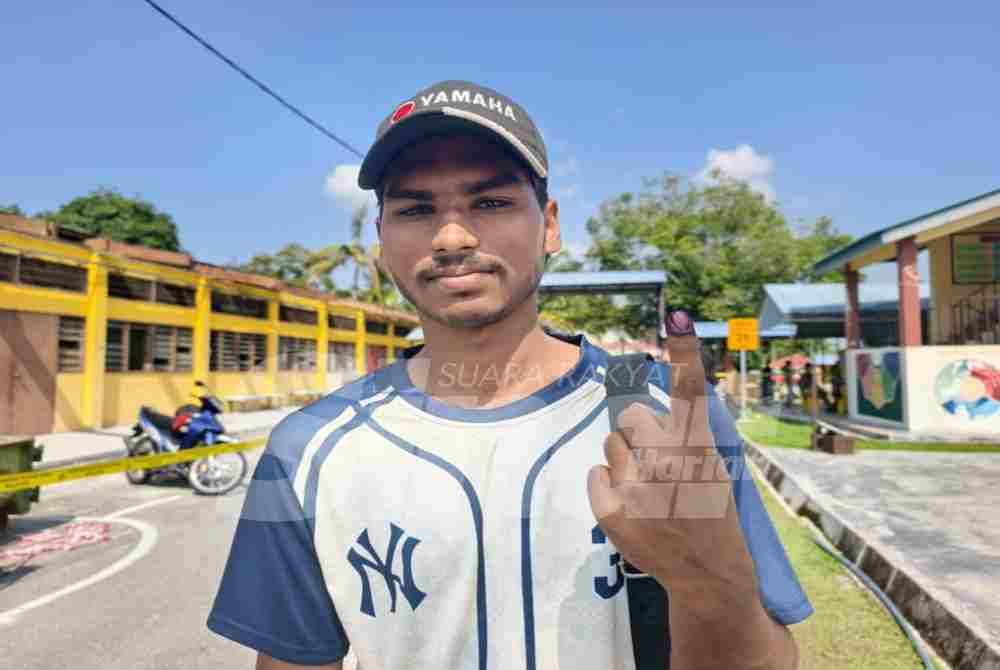 First-time voter M. Kavinesh, 18, from Kampung Jiboi, the experience of casting his ballot brought mixed emotions as he found himself overwhelmed by the large crowds at the polling centre, leaving him slightly confused.