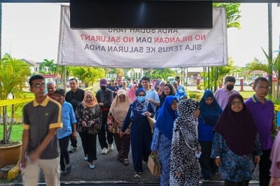 A total of 401 polling centres involving 1,668 streams for the 16th Negeri Sembilan state election opened simultaneously at 8am today, with 859,760 registered voters, including 7,391 postal voters, eligible to cast their ballots in the contest for the 36 state seats. Photo by Bernama