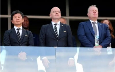FIFA President Gianni Infantino (center) (Photo by AFP)