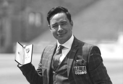 Lance Corporal Nirmal Purja poses with his medal after being appointed a Member of the Order of the British Empire (MBE) during an investiture ceremony at Windsor Castle, on June 8, 2022. (Photo by Andrew Matthews / POOL / AFP)