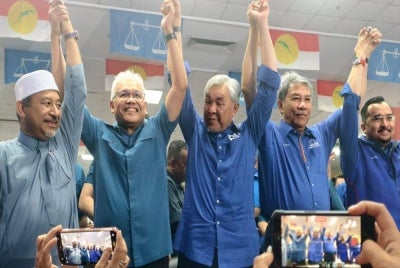 Analysts said the “Malay Unity” narrative, PH dissatisfaction and BN-PN vote consolidation were key factors behind their Negeri Sembilan victory.