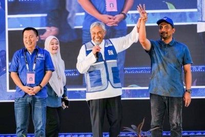 BN’s Mohd Zaidy (right) retained the Jeram Padang state seat after winning a four-cornered contest in the Negeri Sembilan election. Photo: Zaidy's Facebook