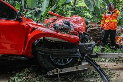 Maran Umno Youth chief Mohd Radzi Rahimi was among the four people killed after the four-wheel drive vehicle they were travelling in was crushed by a falling tree along the Kuala Lumpur-Bentong old road near Janda Baik, Bentong this afternoon. Photo by Bernama