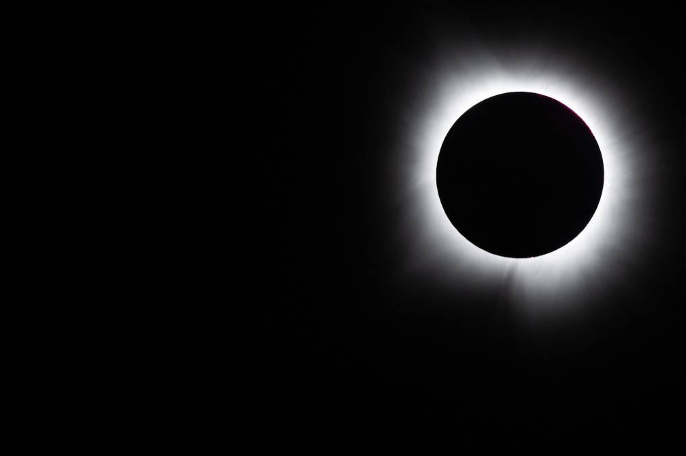 The moon fully passes over the sun's horizon during a Total solar eclipse on April 8, 2024 in Brady, Texas. - (Photo by Brandon Bell / AFP)