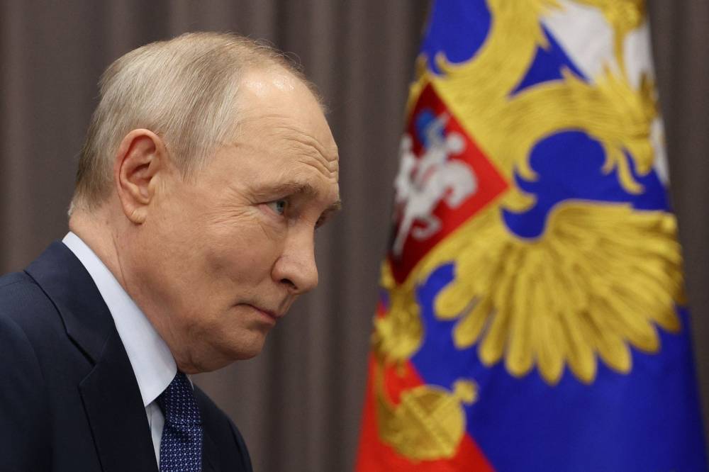 Russia's President Vladimir Putin. (Photo by Vyacheslav PROKOFYEV / POOL / AFP)