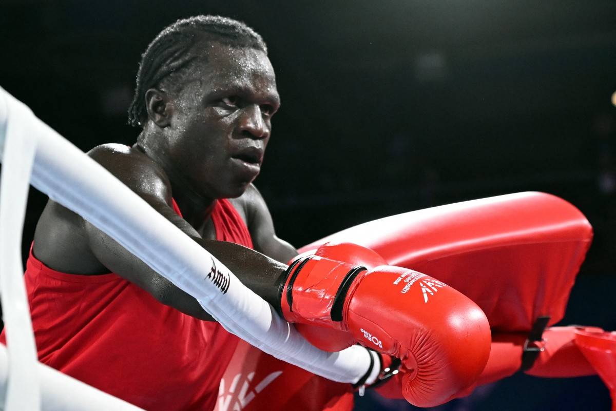 The Ugandan sporting news website NBS Sport said that four members of Uganda's boxing team have reportedly gone missing in Scotland. (Photo by ANDY BUCHANAN / AFP)