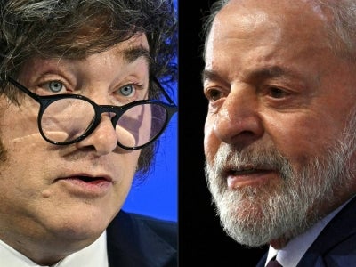  Argentina’s President Javier Milei (L) and Brazil's President Luiz Inacio Lula da Silva (R). (Photo by Fabrice COFFRINI and EVARISTO SA / AFP)
