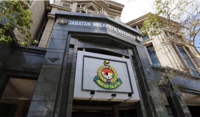 - The Malaysian Immigration Department (JIM) detained three Indonesian nationals, including a man suspected to be the mastermind of a passport forgery syndicate, during operations at two locations around here last night. File photo.