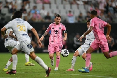 Inter Miami's Argentine forward #10 Lionel Messi (C), San Luis' midfielder #21 Oscar Macias (2nd-R) and Inter Miami's Italian midfielder #42 Yannick Bright eye the ball during the Leagues Cup 2026 group-stage football match between Inter Miami CF and Atletico de San Luis at Nu Stadium in Miami, Florida, on August 5, 2026. (Photo by CHANDAN KHANNA / AFP)