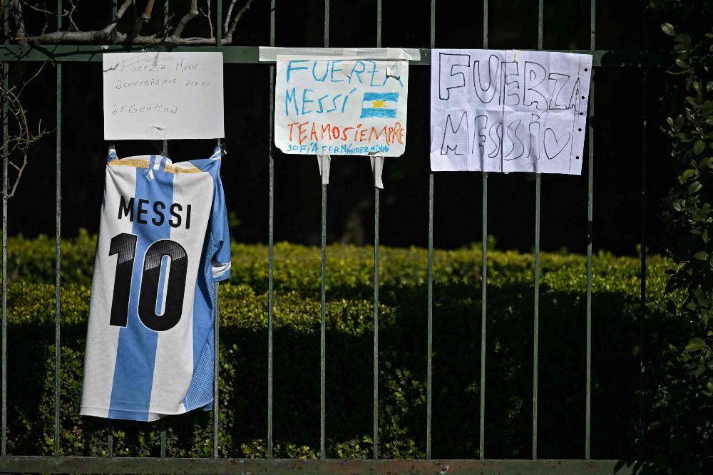 A jersey and signs reading