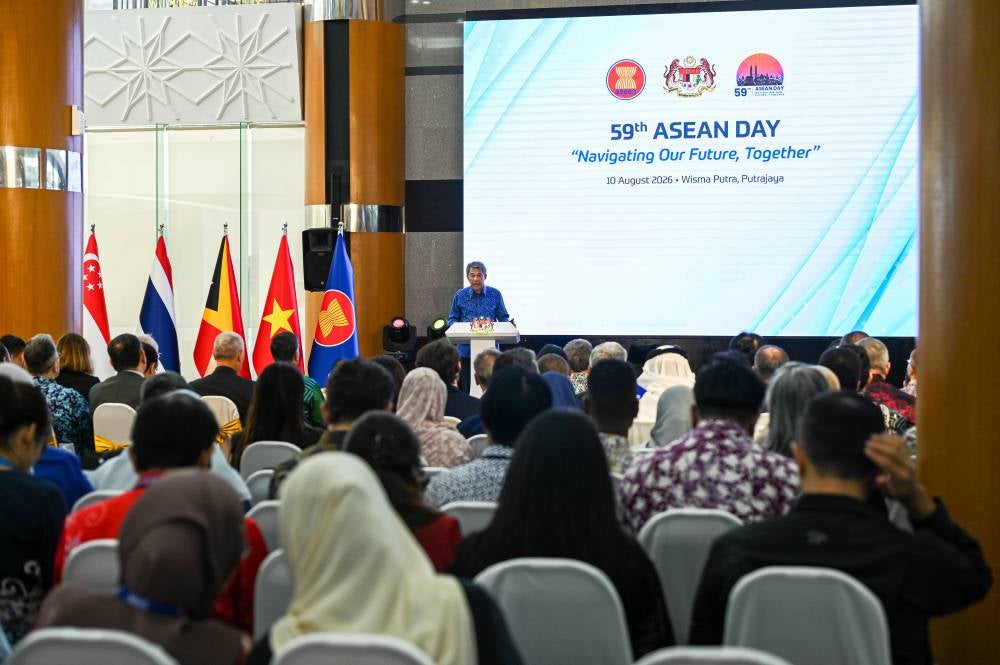 Foreign Minister Datuk Seri Mohamad Hasan delivers his remarks during the 59th ASEAN Day celebration at Wisma Putra today. - BERNAMA photo
