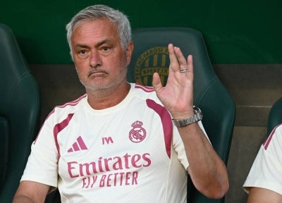 Real Madrid's Portuguese coach Jose Mourinho waves prior to the pre-season football match between Ferencvaros and Real Madrid in Budapest, Hungary on Aug 8, 2026. - (Photo by ATTILA KISBENEDEK / AFP)