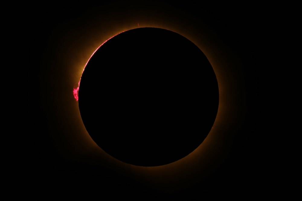 The Sun's corona glows as the Moon completely blocks the Sun during the totality phase of the total solar eclipse as seen from Lodoso, Burgos province, on August 12, 2026. Millions of Europeans contemplated the sky in awe today during a rare total solar eclipse that will plunge a swathe of Spain into an eerie daytime darkness. Photo by AFP