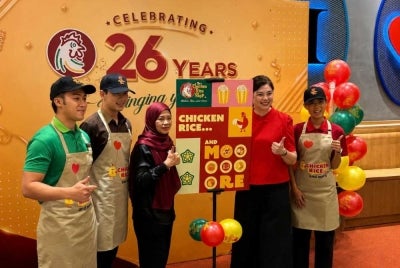 The Chicken Rice Shop rolled out a nationwide brand refresh that covered everything from a new mascot and updated staff uniforms to a freshened-up printed menu and expanded merchandise line. - Photo courtesy of TCRS