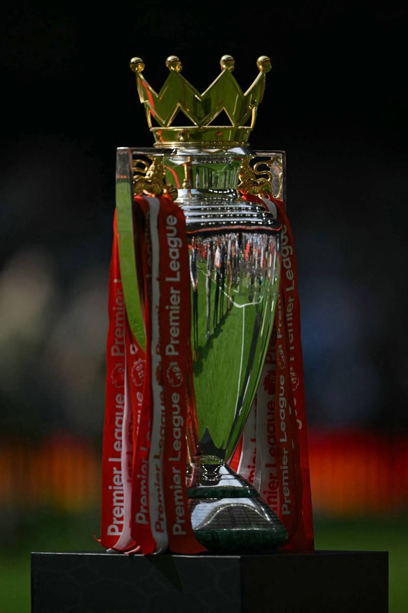 Arsenal's Premier League trophy, on display pitch-side ahead of the English FA Community Shield football match between Arsenal and Manchester City at The Principality Stadium, in Cardiff, south Wales on August 16, 2026. (Photo by Glyn KIRK / AFP)