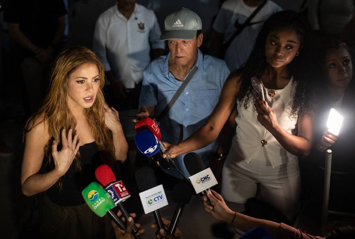 Colombian singer Shakira talks to the media after visiting destroyed areas after a 7.4 earthquake in Quibdo, Colombia on August 17, 2026. The noise of backhoes, cranes and bulldozers echoed across Colombia's quake-hit cities as workers labored to remove rubble, though the chance of finding survivors was slim a week after the disaster. (Photo by AFP)