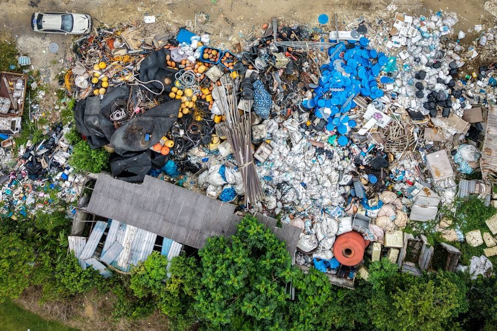 Singapore halts construction waste exports to Malaysia after dumping probe