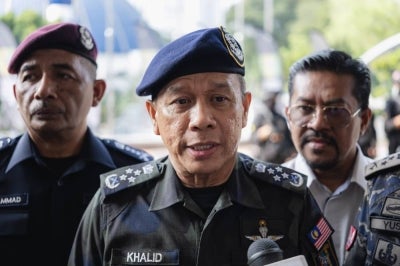 Inspector-General of Police Tan Sri Mohd Khalid Ismail stated that authorities cannot yet confirm the exact number of Malaysian nationals in custody while initial inquiries remain ongoing. - BERNAMA photo
