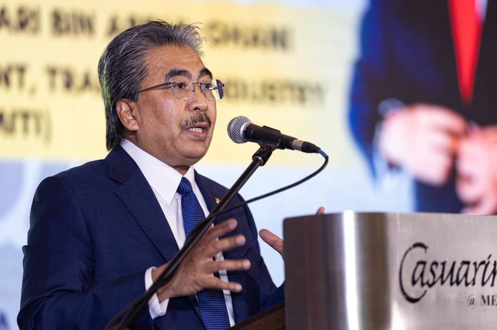 Investment, Trade and Industry Minister Datuk Seri Johari Abdul Ghani delivering his speech at the Invest in Perak Day 2026 programme in Ipoh, today. - Photo by Bernama
