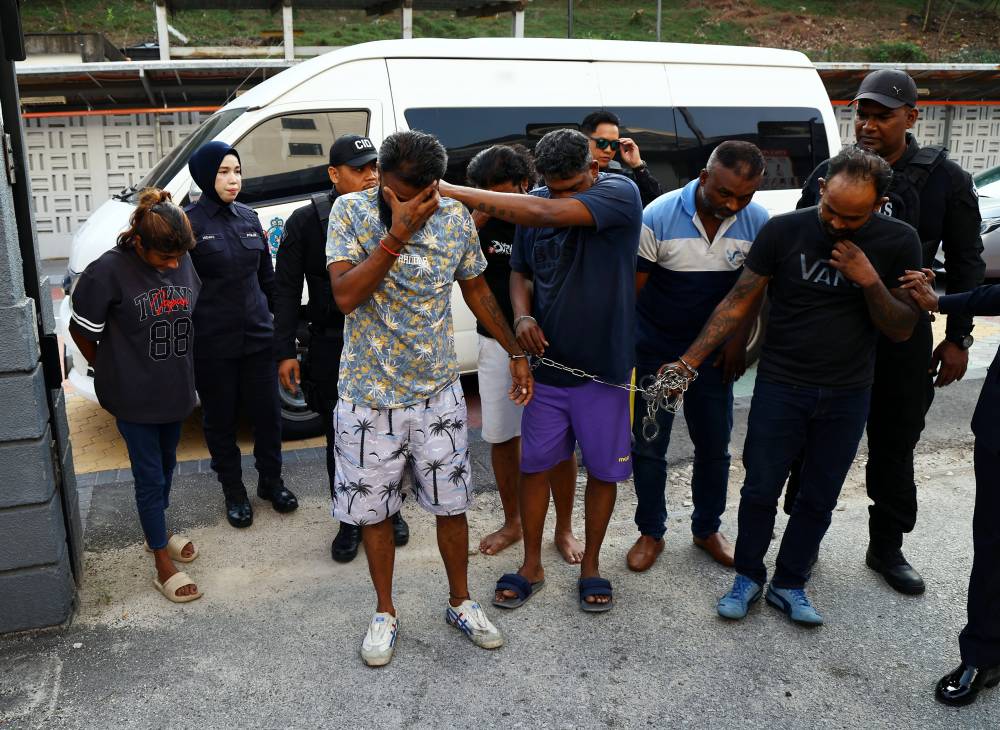 M. Balamurugan, 46, K. Saravanan, 40, P. Sri Devi, 41, G. Puganeswaran, 38, S. Gobinath, 38, and X. Adwin Nicholas, 41, pleaded not guilty to a charge of kidnapping a Singaporean man, 32, for the purpose of obtaining a ransom of S$20,000 (RM63,000), earlier this month. - Photo by Bernama