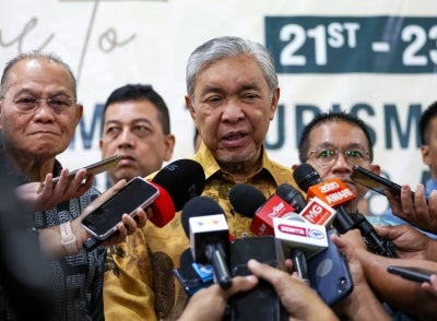 Deputy Prime Minister Datuk Seri Ahmad Zahid Hamidi speaking to reporters after officiating the Ministers and Chief Executive Officers Summit in conjunction with the World Islamic Tourism & Trade Expo 2026 at the World Trade Centre Kuala Lumpur, today. - Photo by Bernama