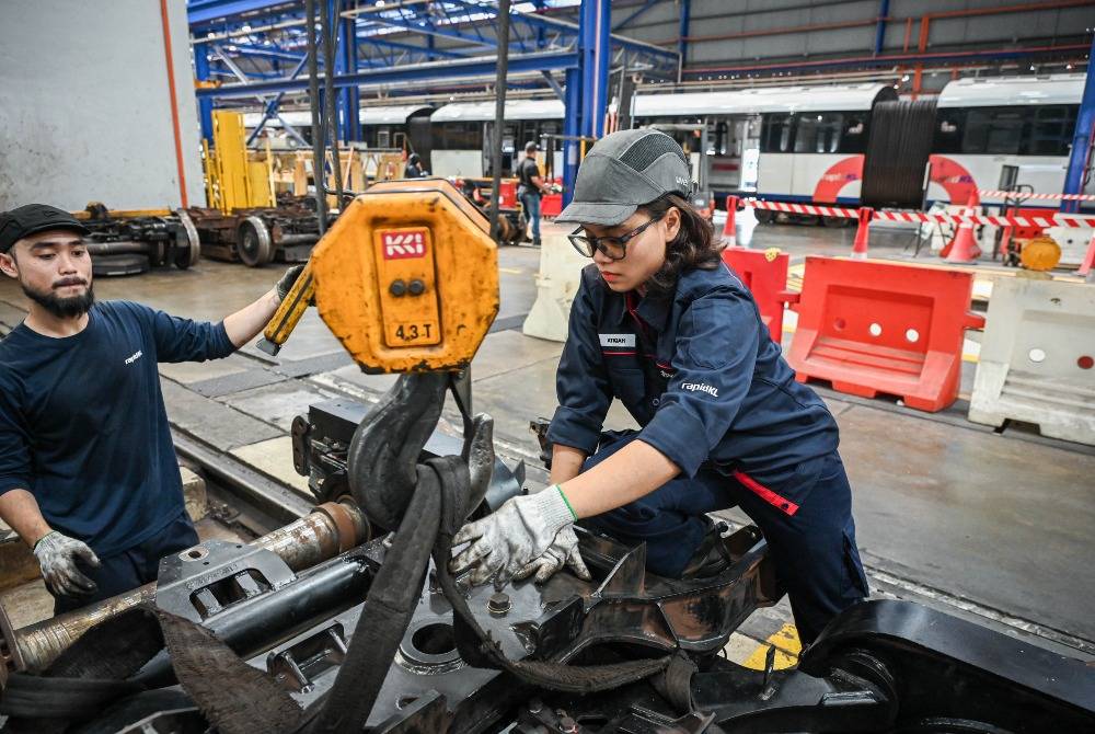 Rapid Rail Sdn Bhd’s Depot Equipment Unit technician Nur Atiqah Norhaizad, 28, is the only female in a team. - Bernama photo