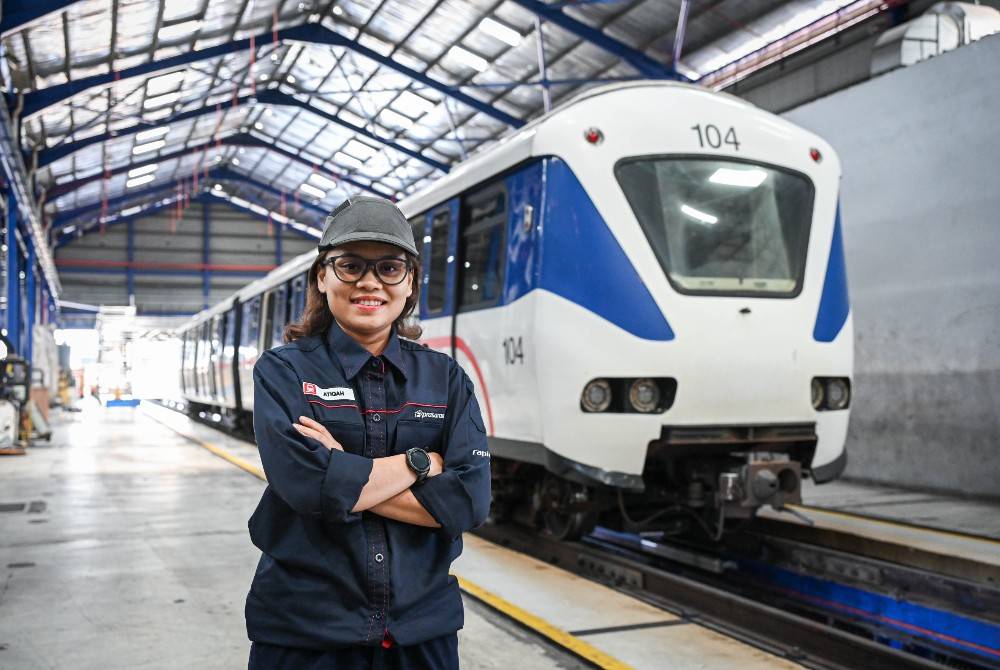 Rapid Rail Sdn Bhd’s Depot Equipment Unit technician Nur Atiqah Norhaizad, 28, is the only female in a team. - Bernama photo