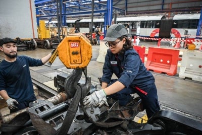 Rapid Rail Sdn Bhd’s Depot Equipment Unit technician Nur Atiqah Norhaizad, 28, is the only female in a team. - Bernama photo