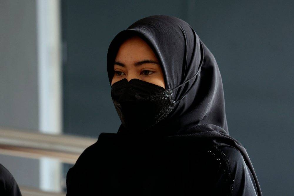 The NGO secretary Noor Sahira Abdullah, 30, pleaded not guilty to 34 counts of abetting Abdullah by intentionally assisting him in making the money transfers via online banking at the same location and on the same dates. Photo by Bernama