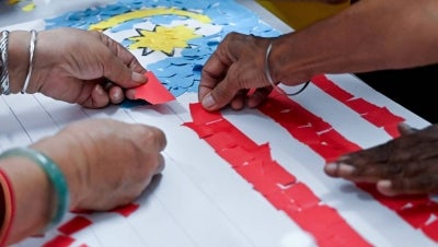 The making of Jalur Gemilang flags at the Perak State Halaman Suri Sejahtera (Senior Citizens' Activity Centre) during a recent visit by Bernama to Taman Lapangan Terbang on Aug 10, 2026. (BERNAMA PHOTO)