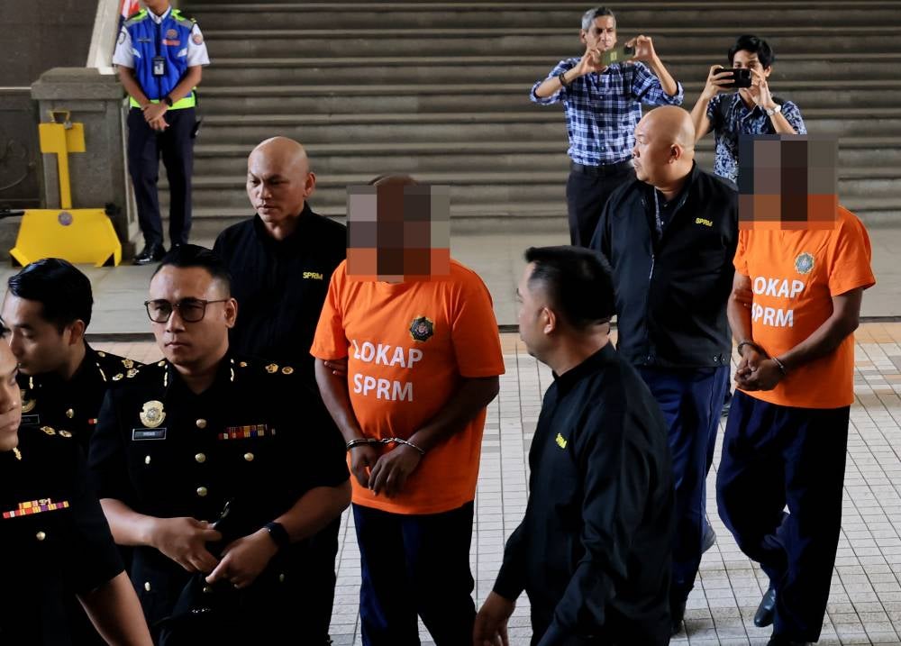 A former Lembaga Tabung Haji chairman and a former Treasury Secretary-General have each been remanded for seven days to assist in investigations into findings contained in the Royal Commission of Inquiry (RCI) report on the institution. - Photo by Bernama