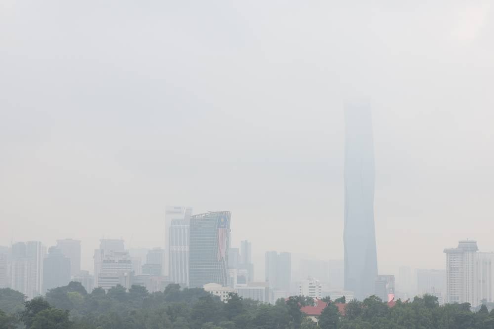 The capital city skyline appears hazy as visibility is affected by the haze on Aug 26, 2026. - Photo by Bernama