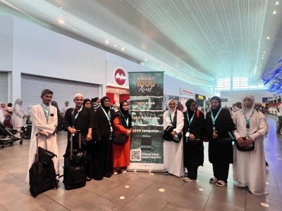 Asnaf pilgrims sponsored to perform Umrah through Ikhlas’ CSR initiative. 
