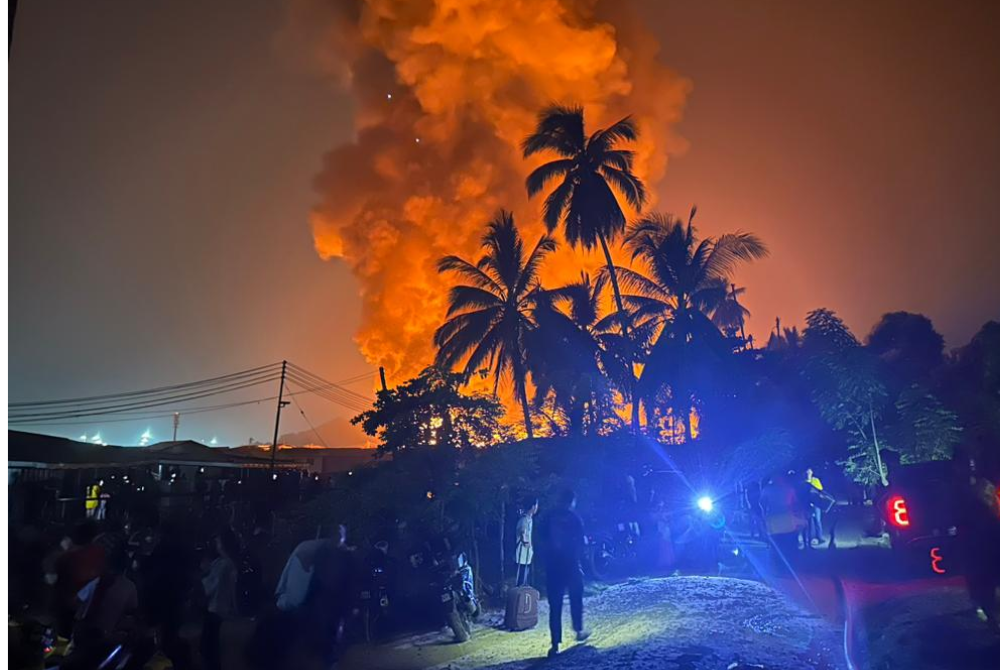 Three children died after a fire tore through a floating squatter settlement of around 202 houses here early on Sunday. Photo courtesy of Fire and Rescue Department 