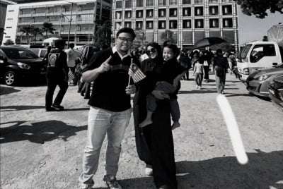 A photograph of married couple Muhammad Nazatul Nazmi, 32, and Nur Atiqah Sofiya Mohd Kazwan Kassim, 32, and their son Muhammad Armaan Nazeef, 4, who were killed in an 11-vehicle collision at KM110.3 of the LPT eastbound near Lanchang, last night after celebrating the National Day in Putrajaya. - Photo via Bernama