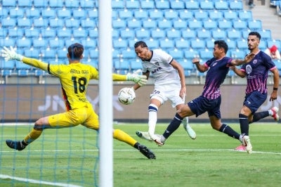 JDT player Daniel Lima De Castro (second, left) scores a goal after beating two UM-Damansara United players during the round of 16 of the 2026/2027 FA Cup. Photo by Bernama