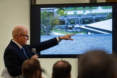 Deputy Utah County Attorney Chad Grunander points out a “shooter’s perch” in an on-screen image during his closing arguments in the preliminary hearing for Tyler Robinson, the man accused of fatally shooting Charlie Kirk, at the 4th District Court on Sept 1, 2026 in Provo, Utah. - (Photo by POOL / GETTY IMAGES NORTH AMERICA / Getty Images via AFP)