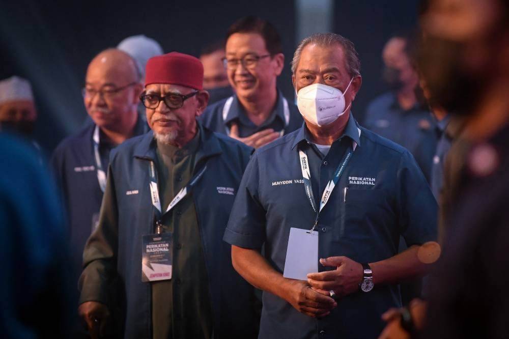 Bersatu does not have to out-Malay Pas-Umno, it only needs to prevent them from monopolising the vote. Pas president Tan Sri Abdul Hadi Awang and Bersatu president Tan Sri Muhyiddin Yassin during better times united under Perikatan Nasional. (FILE PIX)