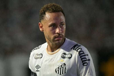 Santos' forward #10 Neymar gestures during the first leg of the Copa Sudamericana round of 16 football match between Brazil's Santos and Ecuador's Macara, at the Urbano Caldeira stadium in Santos, state of Sao Paulo, Brazil, on Aug 13, 2026. - (Photo by NELSON ALMEIDA / AFP)