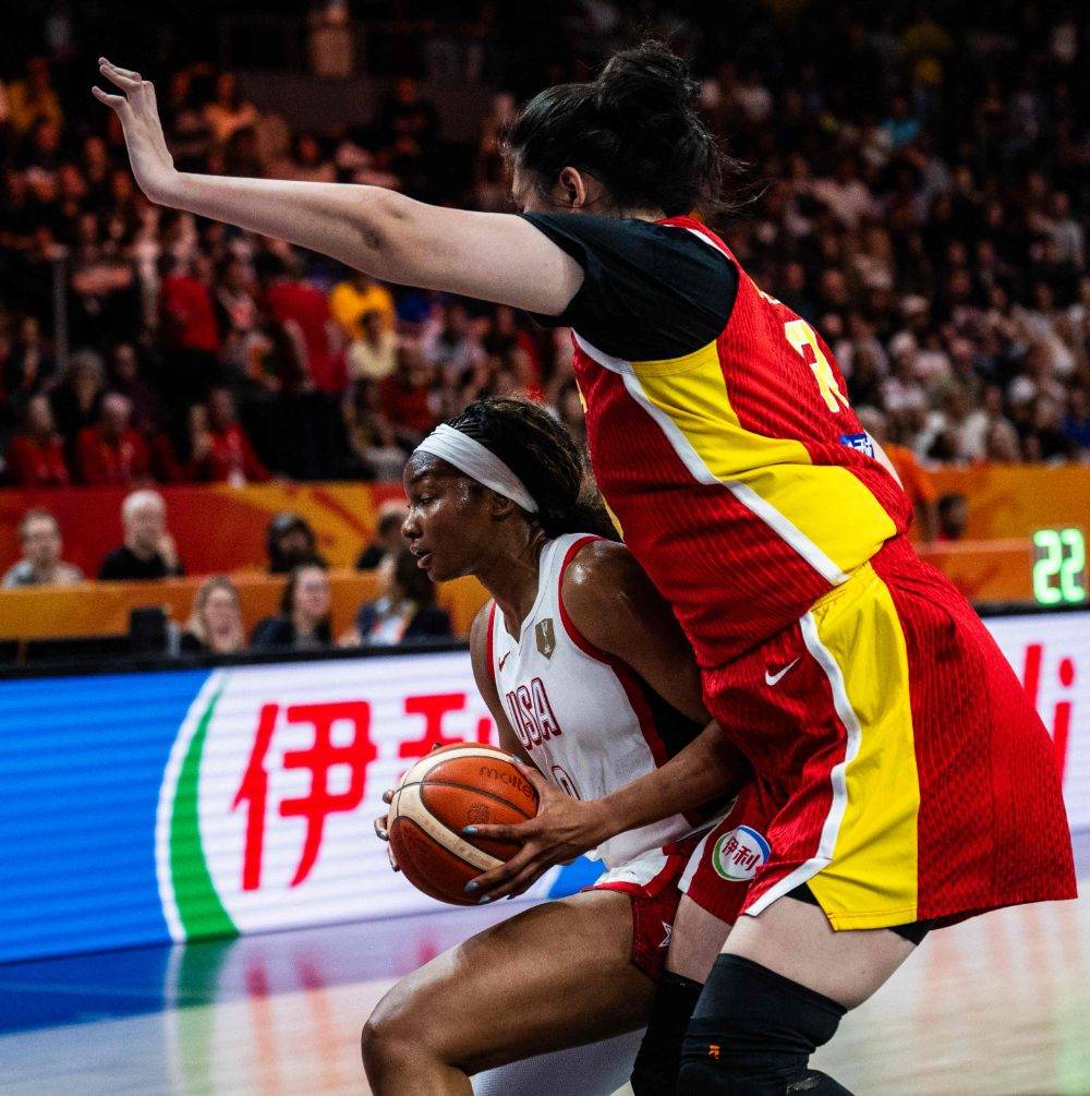 USA's forward #09 Kiki Iriafen is blocked by China's center #19 Zhang Ziyu during the 2026 FIBA Women's Basketball World Cup Group D match between USA and China at the Max-Schmeling-Halle in Berlin on Sept 4. Photo by AFP