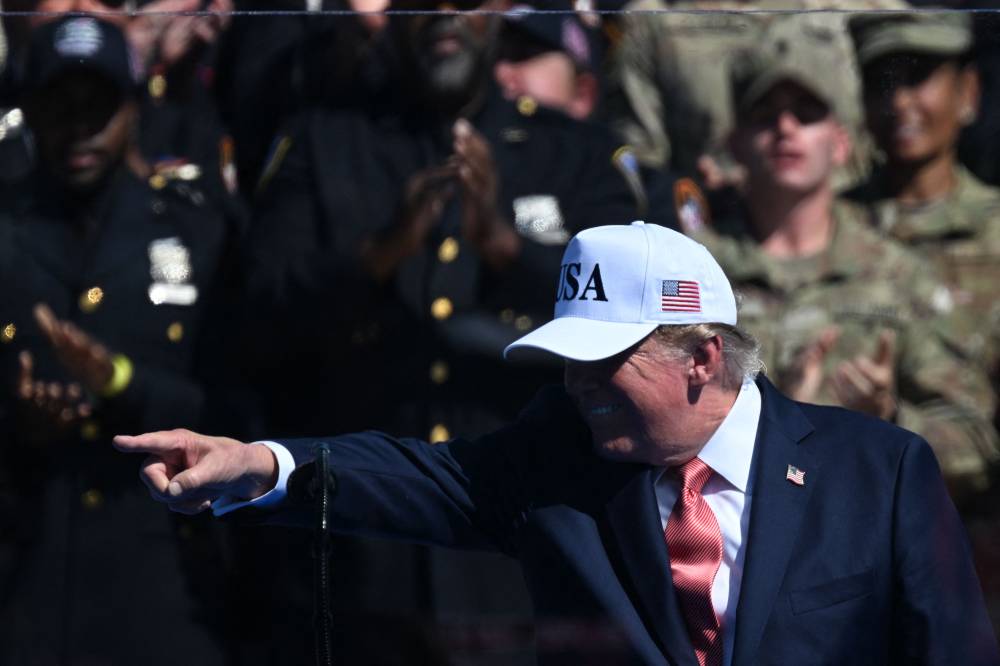 US President Donald Trump gestures as he speaks during a Steel Across America event at the White House in Washington, DC, on Sept 8, 2026. - (Photo by ALEX WROBLEWSKI / AFP)