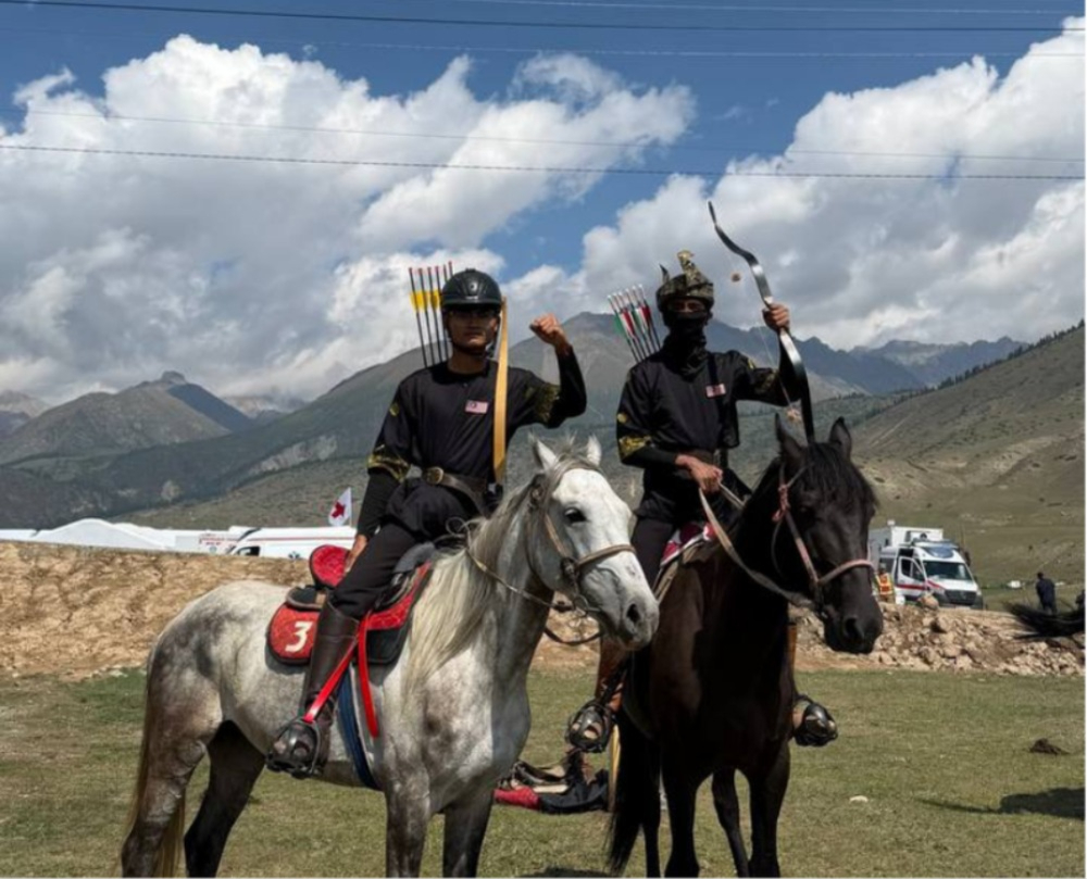 Hadiff Hamidi (left) on horseback at the World Nomad Games 2026 in Kyrgyzstan.
- Photo courtesy of Hadiff Hamidi.