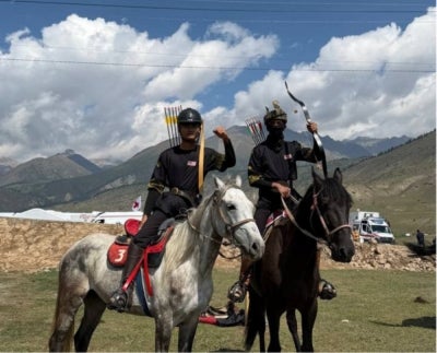 Hadiff Hamidi (left) on horseback at the World Nomad Games 2026 in Kyrgyzstan.
- Photo courtesy of Hadiff Hamidi.