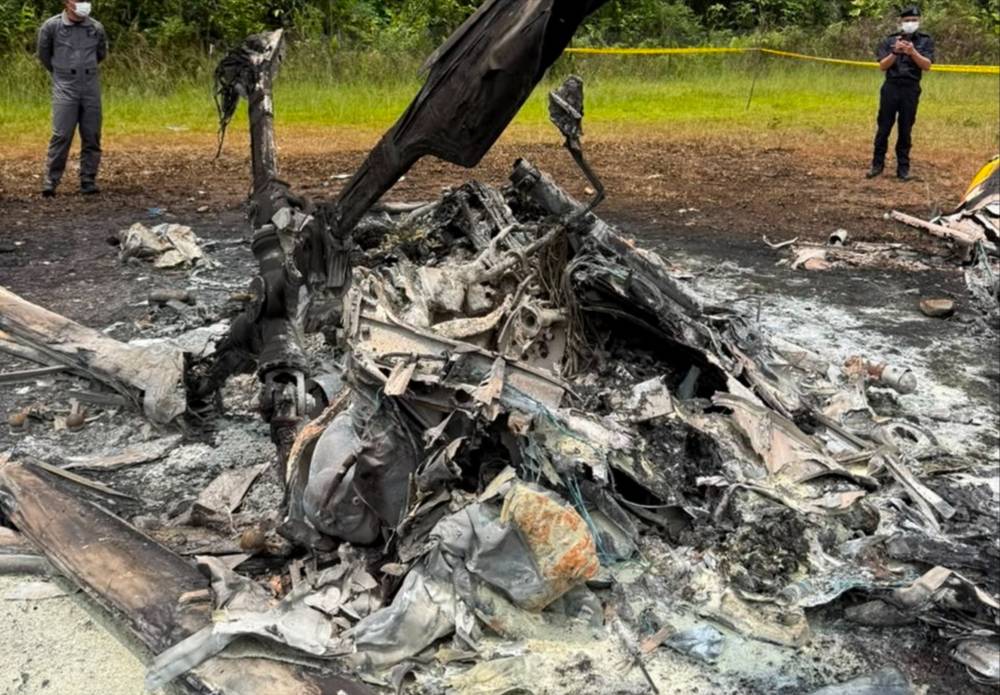 The BO-105 S helicopter crashed at the end of the Long Lellang STOLport, killing pilot Capt Zainol Afiq Bee Sham, 30, Dr Ainul Baraah Kamaruddin, 33, medical assistant Alexson Adit Henry, 31, staff nurses Debra Moset, 40, and Jessie Paya Jok, 44. Photo by Bernama