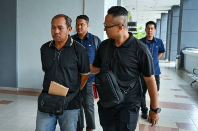Mohd Suhaimi Yusof, 50, was fined RM30,000 after pleading guilty at the Seremban Sessions Court today to five charges of sending obscene messages via WhatsApp to his ex-wife's current husband in March 2023. - Photo by Bernama