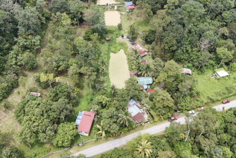 An aerial view of the properties claimed to be set for acquisition for the bypass project. - Photo by SYAHRIN KHAIRI