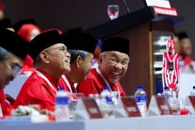 Umno President Datuk Seri Ahmad Zahid Hamidi arrived to deliver the Presidential Policy Speech at the 2026 Umno General Assembly at Dewan Merdeka, World Trade Centre Kuala Lumpur, today. (BERNAMA PHOTO) 