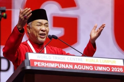 Umno President Datuk Seri Dr Ahmad Zahid Hamidi delivers the Presidential Policy Speech at the 2026 UMNO General Assembly at Dewan Merdeka, World Trade Centre Kuala Lumpur, today. (BERNAMA PHOTO) 